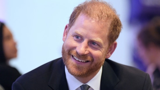 Britain's Prince Harry, Duke of Sussex speaks with an award recipient at the annual WellChild Awards in London on September 8, 2025. (AFP)