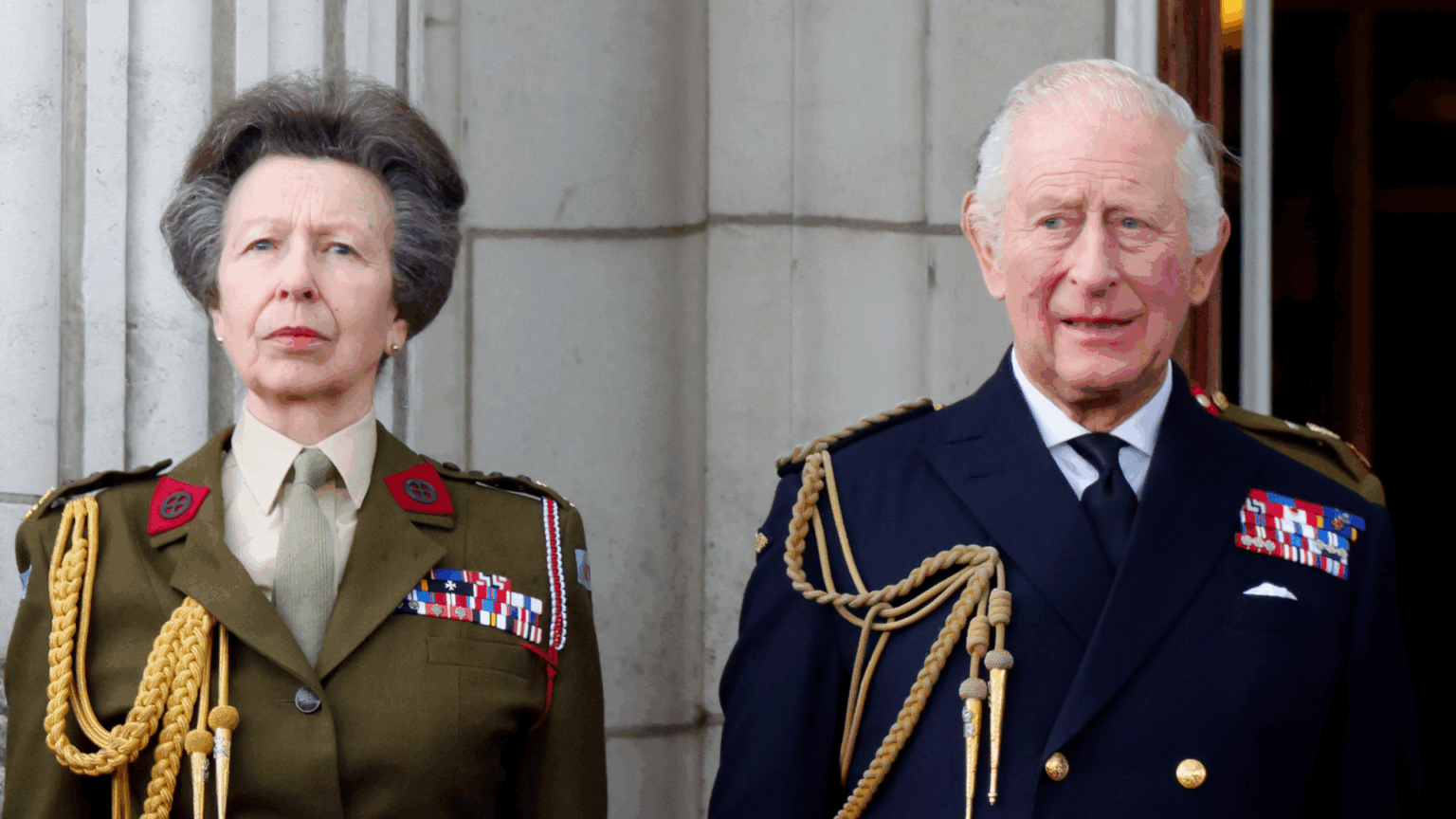 Royal Expert Says Princess Anne Is “Fed Up” With One Royal Family Member Princess Anne standing next to King Charles in military uniforms