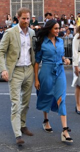 CAPE TOWN, SOUTH AFRICA - SEPTEMBER 23: Meghan, Duchess of Sussex and Prince Harry, Duke of Sussex visit District 6 Museum on September 23, 2019 in Cape Town, South Africa. District 6 is a former inner-city residential area in Cape Town, where freed slaves, artisans, immigrants, merchants and the Cape Malay community lived. For over a hundred years, different communities and races lived side by side, and the District became known for its vibrant culture, music and food. In 1966, the government declared District 6 a whites-only area, and over 60,000 residents were forcibly removed and relocated to the Cape Flats Township. (Photo by Mark Large - Pool/Getty Images)