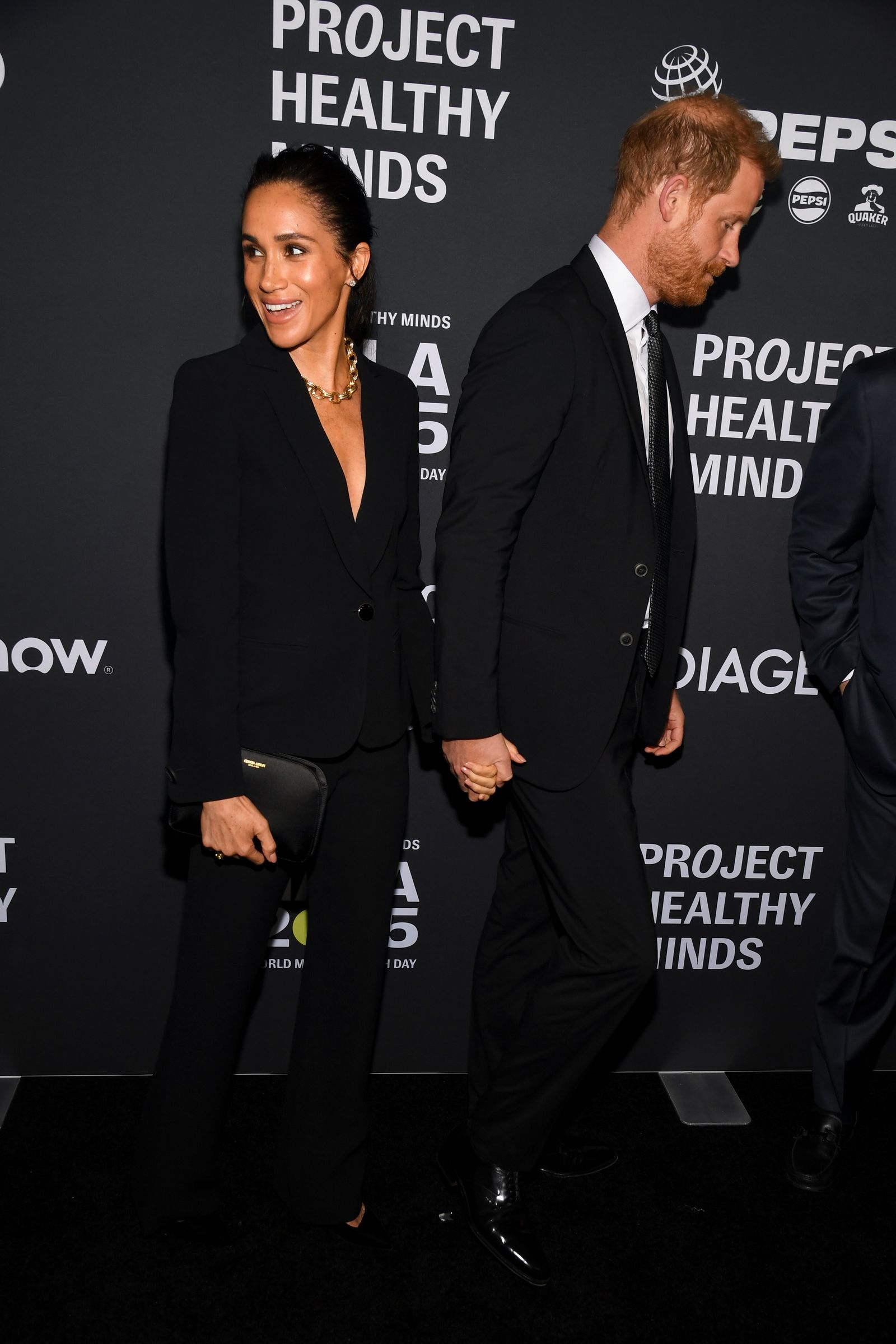 Meghan Markles HighFashion Streak Continues in Armani