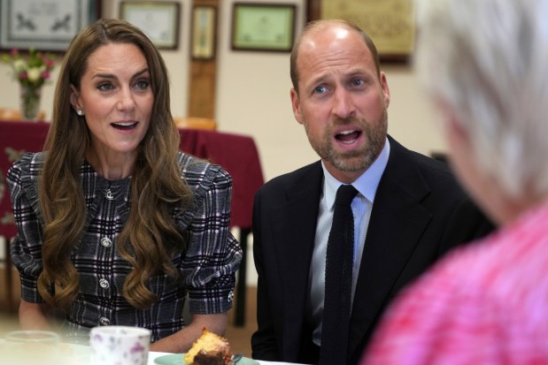 SUNNINGDALE, ENGLAND - SEPTEMBER 8: Catherine, Princess of Wales and Prince William, Prince of Wales speak to members as they visit the National Federation of Women's Institute (WI) to commemorate the three-year anniversary of the death of Queen Elizabeth II on September 8, 2025 in Sunningdale, England. (Photo by Alastair Grant - WPA Pool/Getty Images)