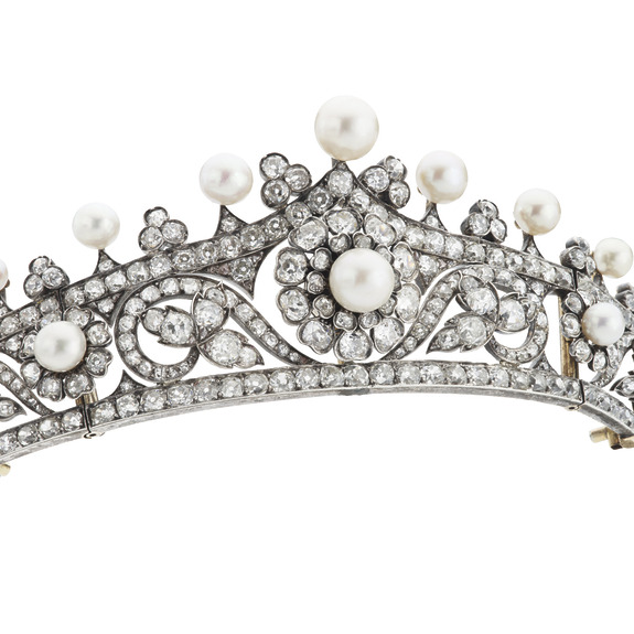 Jeweled tiara adorned with pearls and diamonds on a white background.
