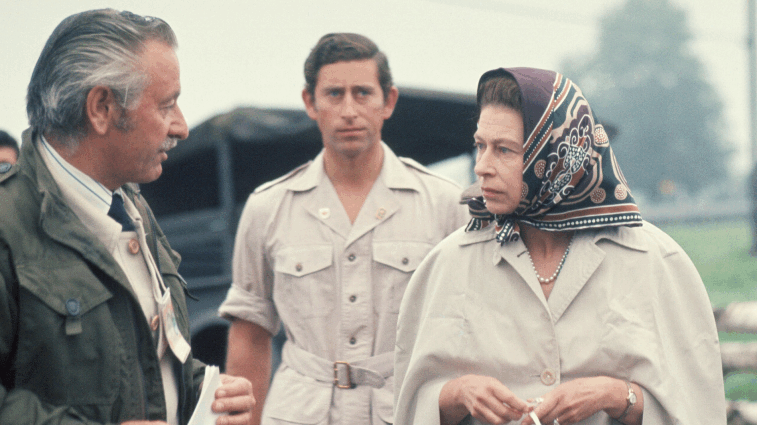Palace Advisors Only “Humored” Prince Charles’s Work Until He Stood Up to the “Men in Gray Suits” Prince Charles and Queen Elizabeth at the 1976 Olympic Games in Canada