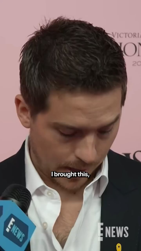 Dylan Sprouse passing out pins at the VSFS to raise endometriosis awareness in honor of wife Barbara Palvin