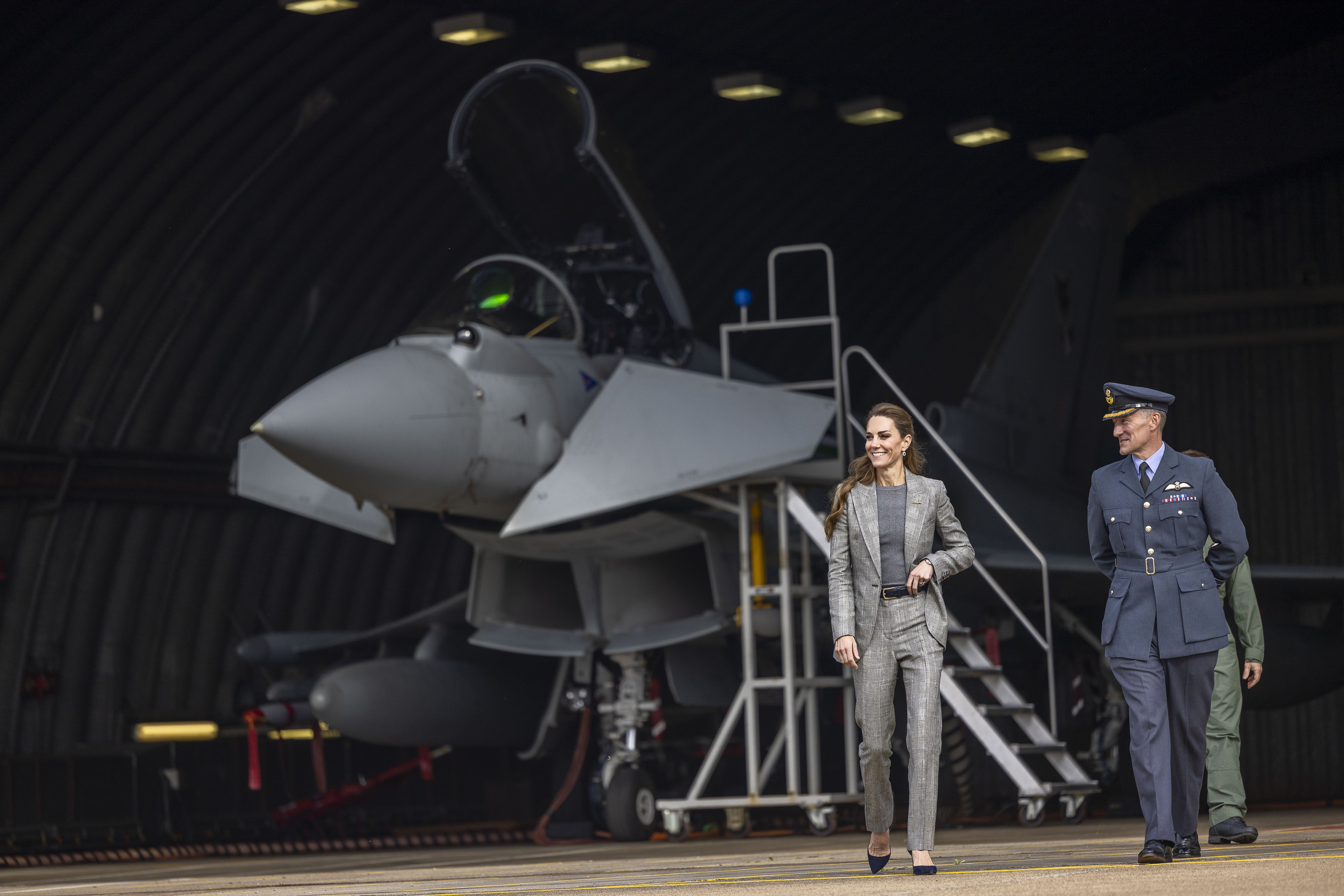 CONINGSBY, ENGLAND - OCTOBER 2: Catherine, Princess of Wales, Royal Honorary Air Commodore, is shown a Typhoon aircraft as she is given a tour of the new Typhoon Future Synthetic Training facility at RAF Coningsby in Lincolnshire during her first official engagement at the station, on October 2, 2025 in Coningsby, England. During the visit, Her Royal Highness learned about the station's operational role, met Quick Reaction Alert personnel, viewed a Typhoon aircraft, and toured the new Typhoon Future Synthetic Training facility, and also met families of personnel serving at the base. (Photo by James Glossop - WPA Pool/Getty Images)