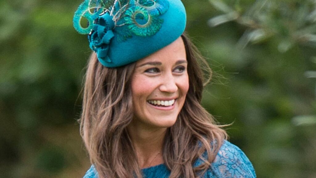 Pippa Middleton shows of glowing sun tan in ra-ra coat dress