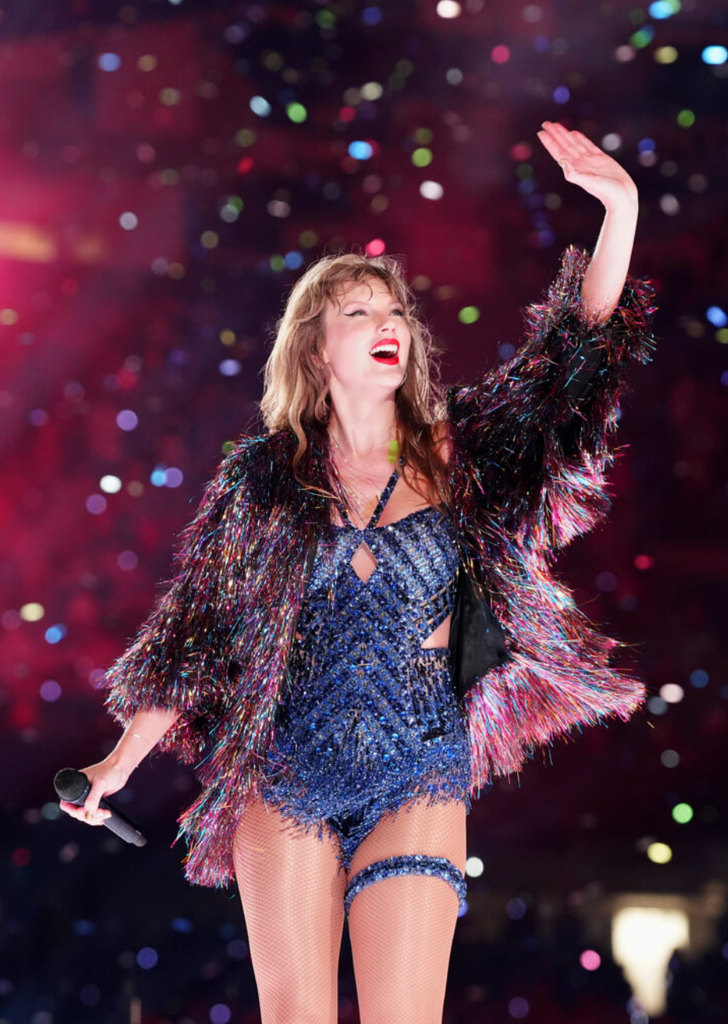 Taylor waving at crowds on the Era's tour