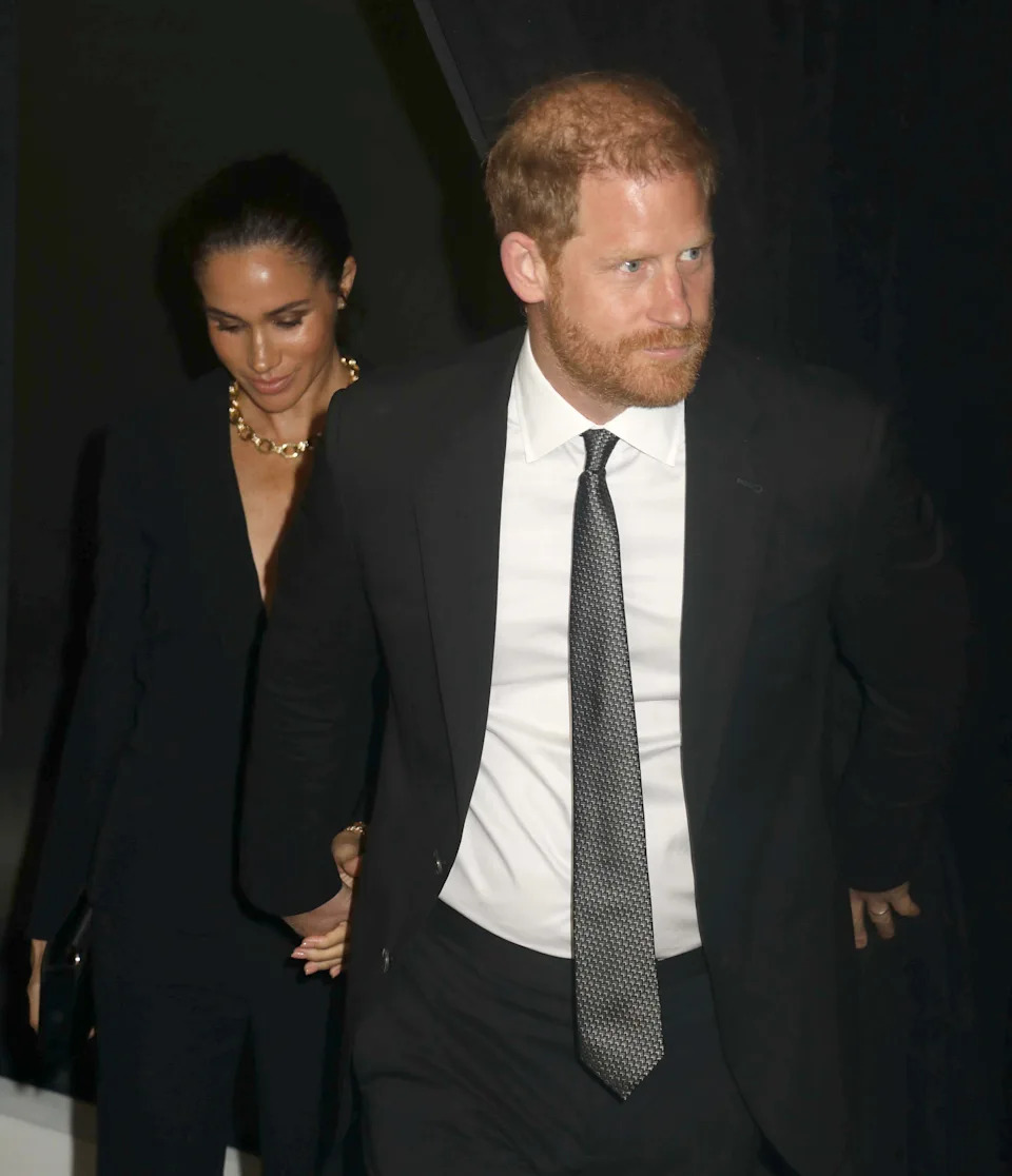 They packed on the PDA in coordinating suit looks for the event. ZUMAPRESS.com