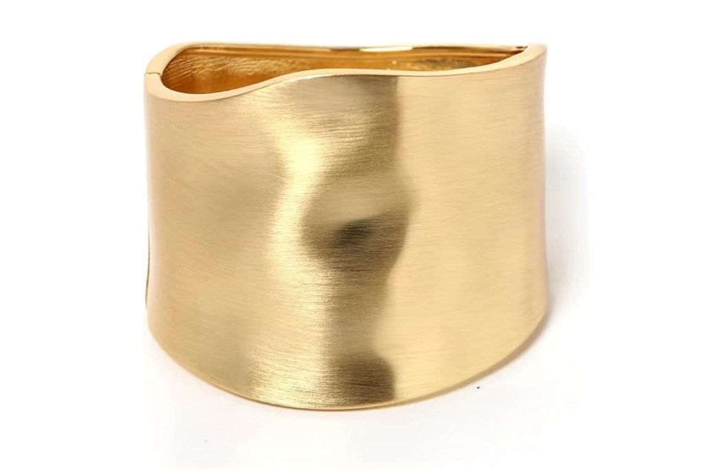 Brushed gold cuff bracelet.
