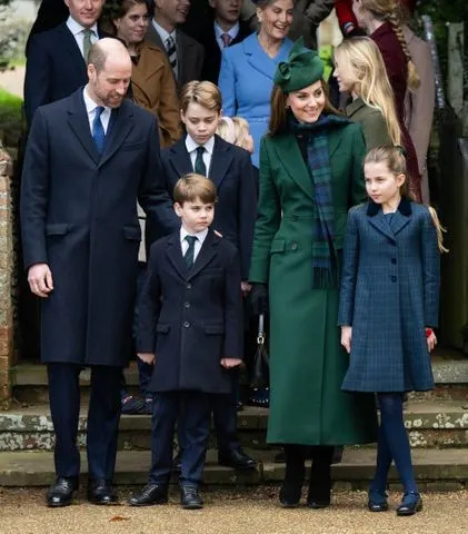 Getty Images Prince William and Kate Middleton with their three children at Sandringham Church in 2024.