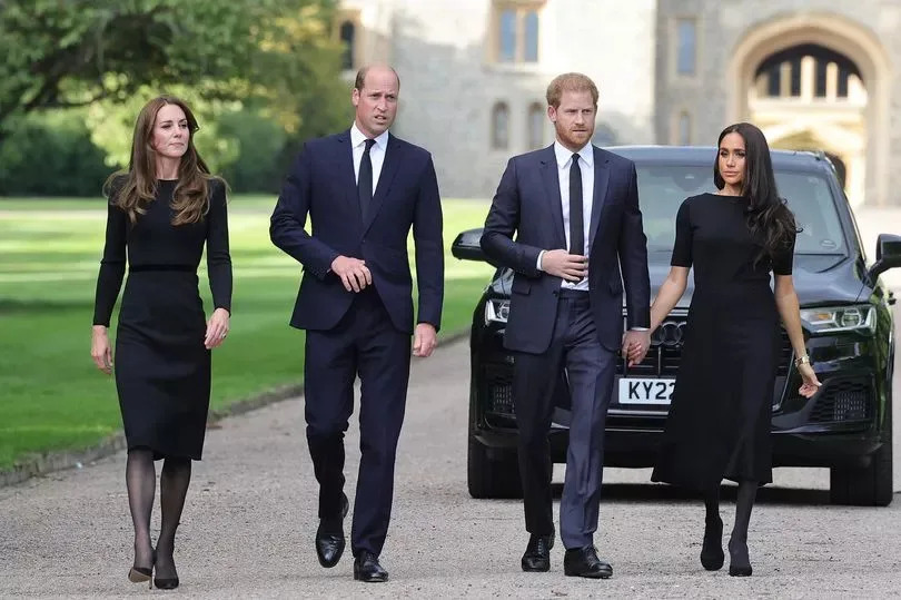 Catherine, Princess of Wales, Prince William, Prince of Wales, Prince Harry, Duke of Sussex, and Meghan, Duchess of Sussex on the long Walk at Windsor Castle arrive to view flowers and tributes to HM Queen Elizabeth on September 10, 2022 in Windsor, England