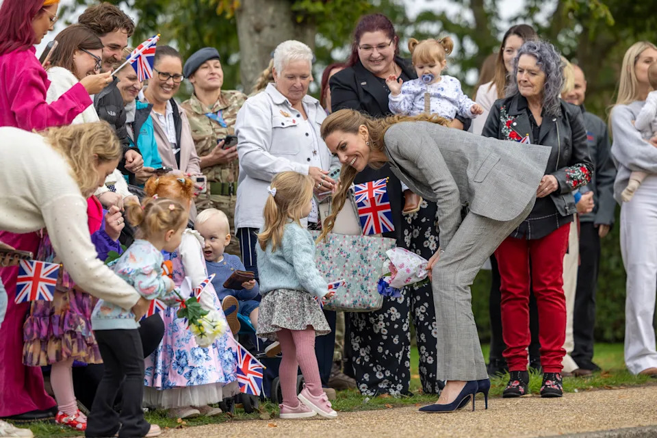 CONINGSBY, ENGLAND - OCTOBER 2: Catherine, Princess of Wales, Royal Honorary Air Commodore, meets families based at RAF Coningsby in Lincolnshire during her first official engagement at the station, on October 2, 2025 in Coningsby, England. During the visit, Her Royal Highness learned about the station's operational role, met Quick Reaction Alert personnel, viewed a Typhoon aircraft, and toured the new Typhoon Future Synthetic Training facility, and also met families of personnel serving at the base. (Photo by James Glossop - WPA Pool/Getty Images)