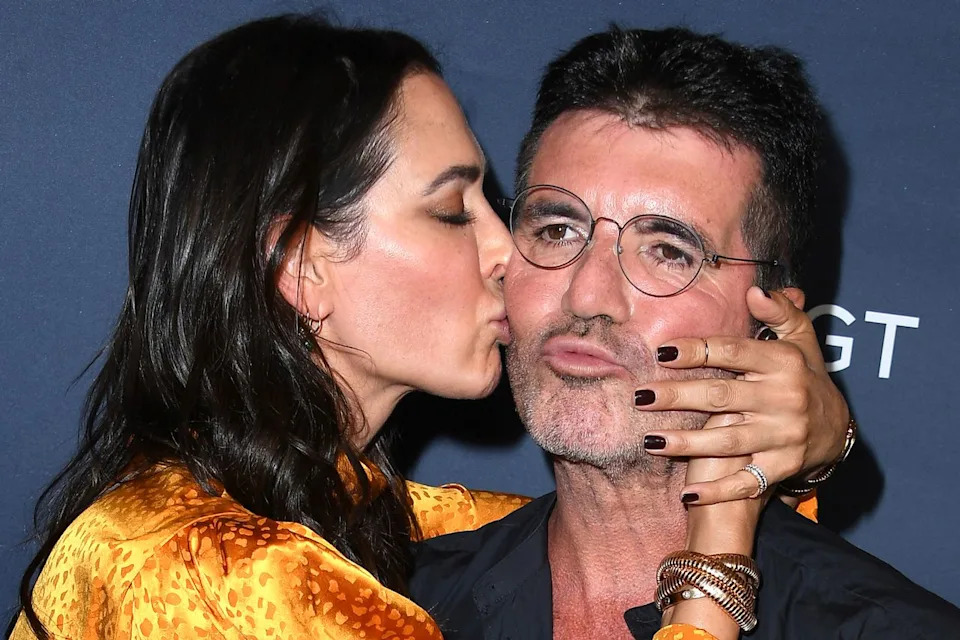 Steve Granitz/WireImage Lauren Silverman and Simon Cowell arrives at the 