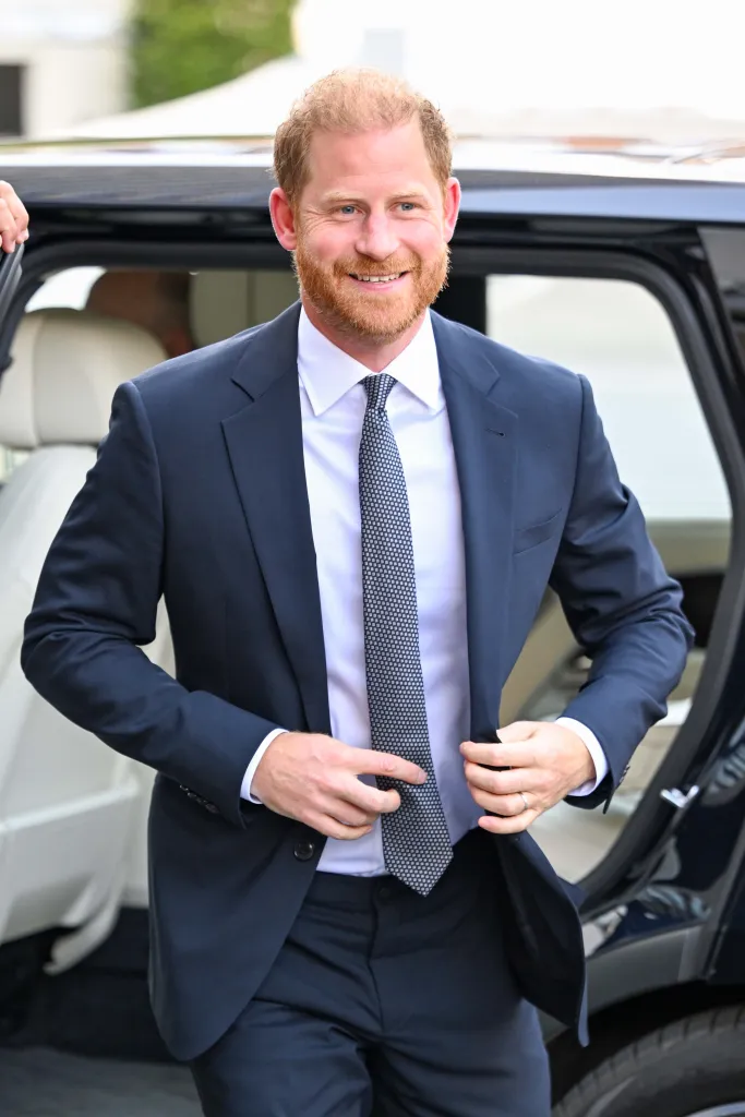 Prince Harry walking and smiling