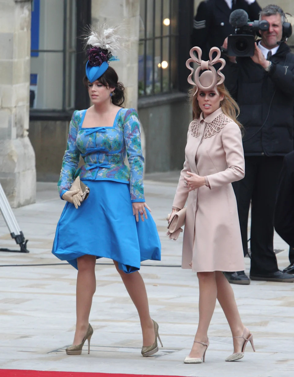 Princess Eugenie and Princess Beatrice wearing quirky hats at Prince William and Kate Middleton's wedding 