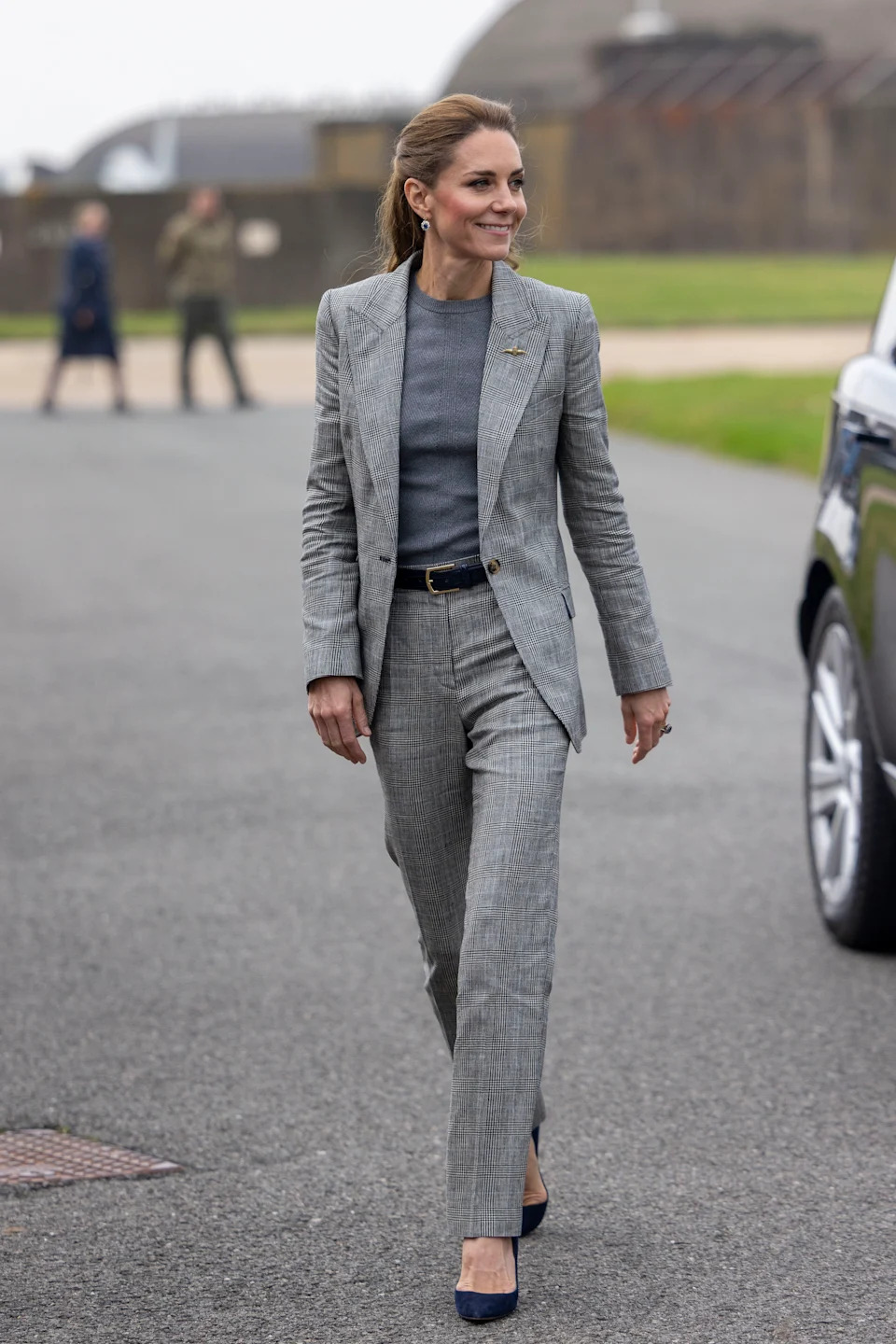 CONINGSBY, ENGLAND - OCTOBER 2: Catherine, Princess of Wales, Royal Honorary Air Commodore, visits RAF Coningsby in Lincolnshire during her first official engagement at the station, on October 2, 2025 in Coningsby, England. During the visit, Her Royal Highness learned about the station's operational role, met Quick Reaction Alert personnel, viewed a Typhoon aircraft, and toured the new Typhoon Future Synthetic Training facility, and also met families of personnel serving at the base. (Photo by James Glossop - WPA Pool/Getty Images)