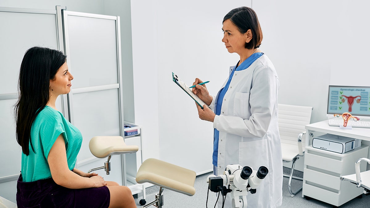 Young woman during appointment with gynecologist
