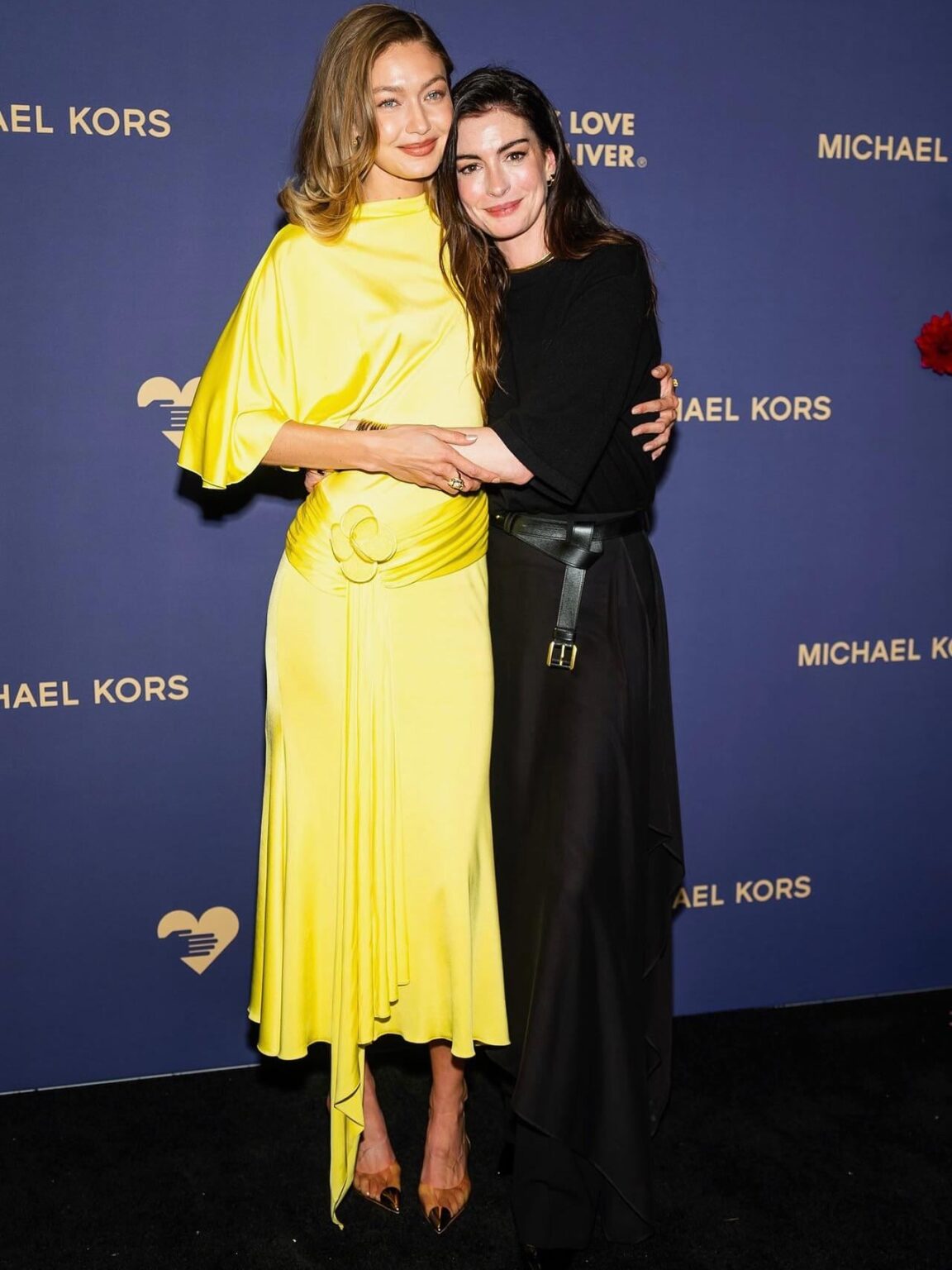 Gigi Hadid with Anne Hathaway at Golden Heart Awards Oct 21, 2025