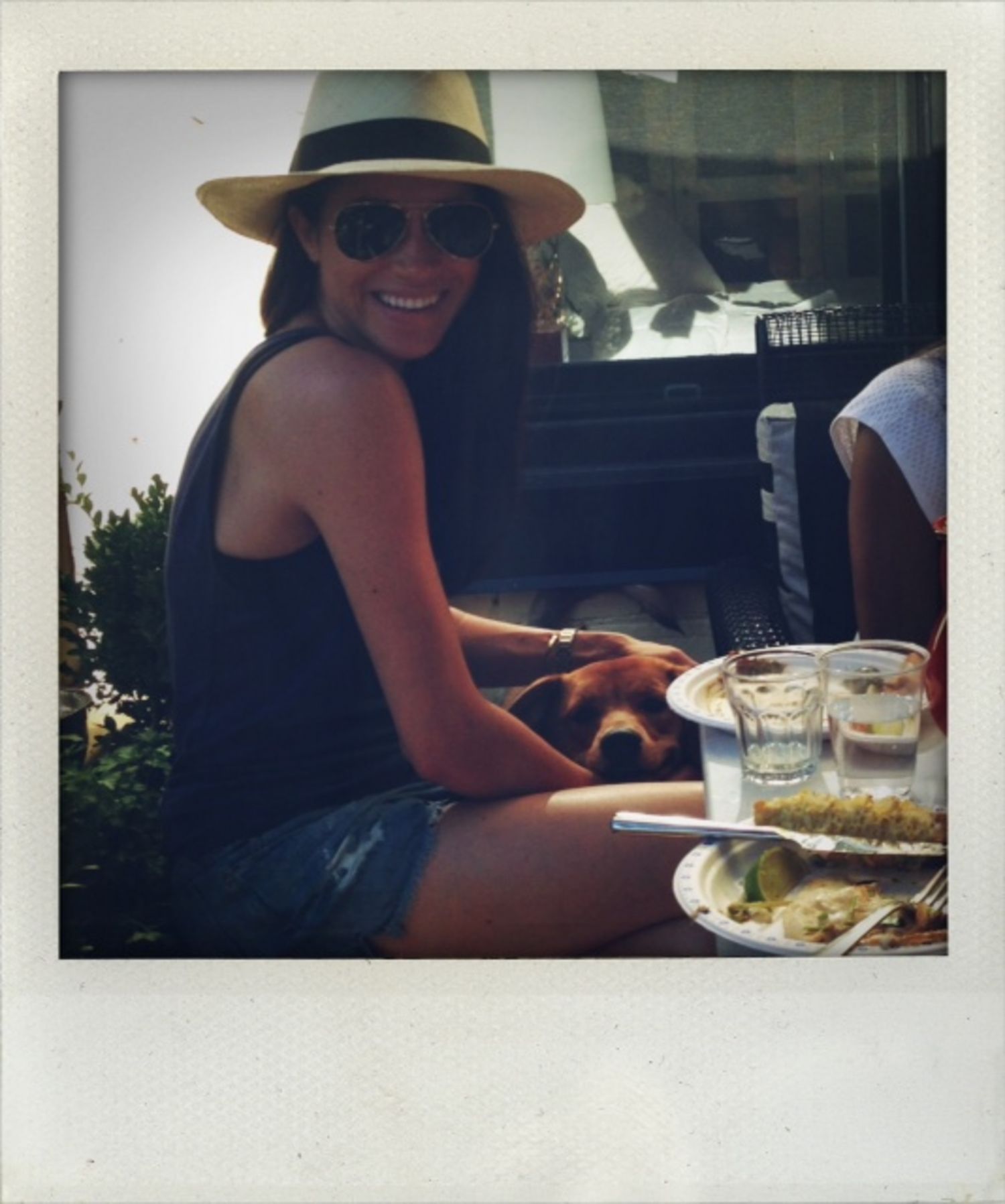 Image may contain Clothing Apparel Human Person Sunglasses Accessories Accessory and Hat