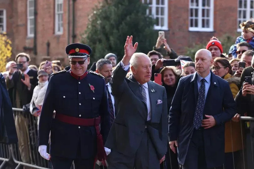 King Charles III waves to crowds as he visits Lichfield Cathedral -Credit:Ian Vogler / Daily Mirror