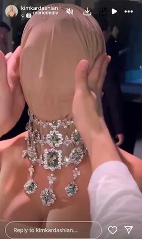 Kim Kardashian Kim Kardashian posted an Instagram video of the final touches of her mask