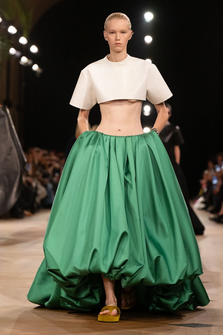 Loose-fit tops, flat shoes and billowing skirts: Backstage, the designer talked about prioritizing comfort.