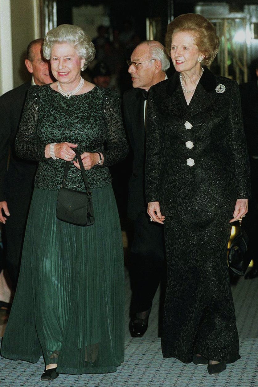 queen elizabeth ii and margaret thatcher walk next to each other at the prime minister's 70th birthday celebration in 1995