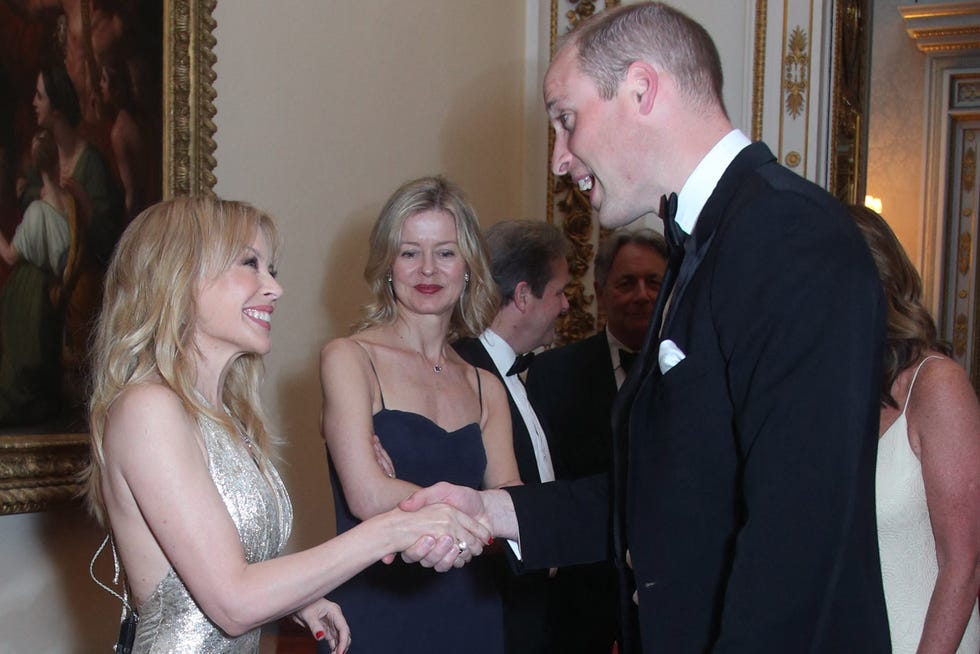 britains prince william, duke of cambridge meets australian british singer kylie minogue (l) as lady helen taylor (c) looks on during a reception for the royal marsden nhs foundation trust at buckingham palace, london on june 14, 2018. (photo by yui mok / pool / afp) (photo by yui mok/pool/afp via getty images)