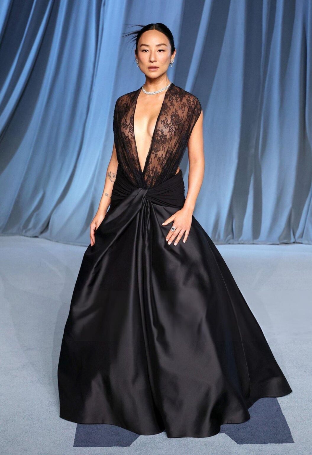 Greta Lee arrives at the 5th Annual Academy Museum Gala in Dior (October 18, 2025)