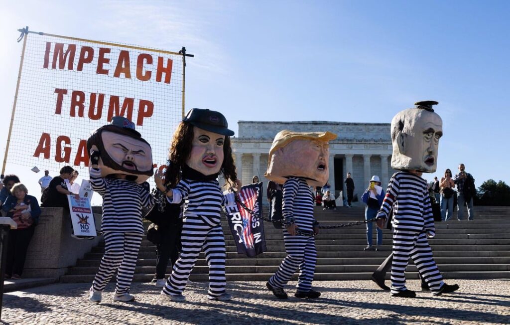 Protest signs seen during the numerous No Kings Day Rallies happening worldwide in D.C., New York, Boston, Chicago, Lisbon, Paris, Berlin, London & more. Millions of people have already taken to the streets to denounce Trump’s fascist regime. (October 18, 2025)