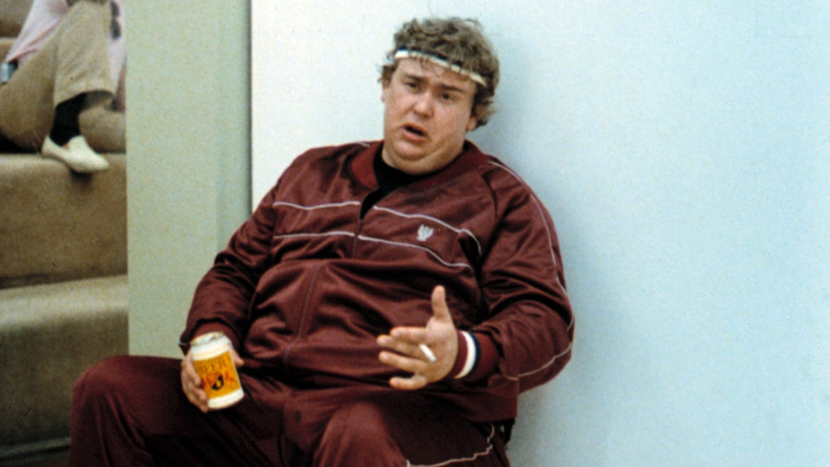John Candy drinking a beer and being exhausted after playing racquetball in "Splash."