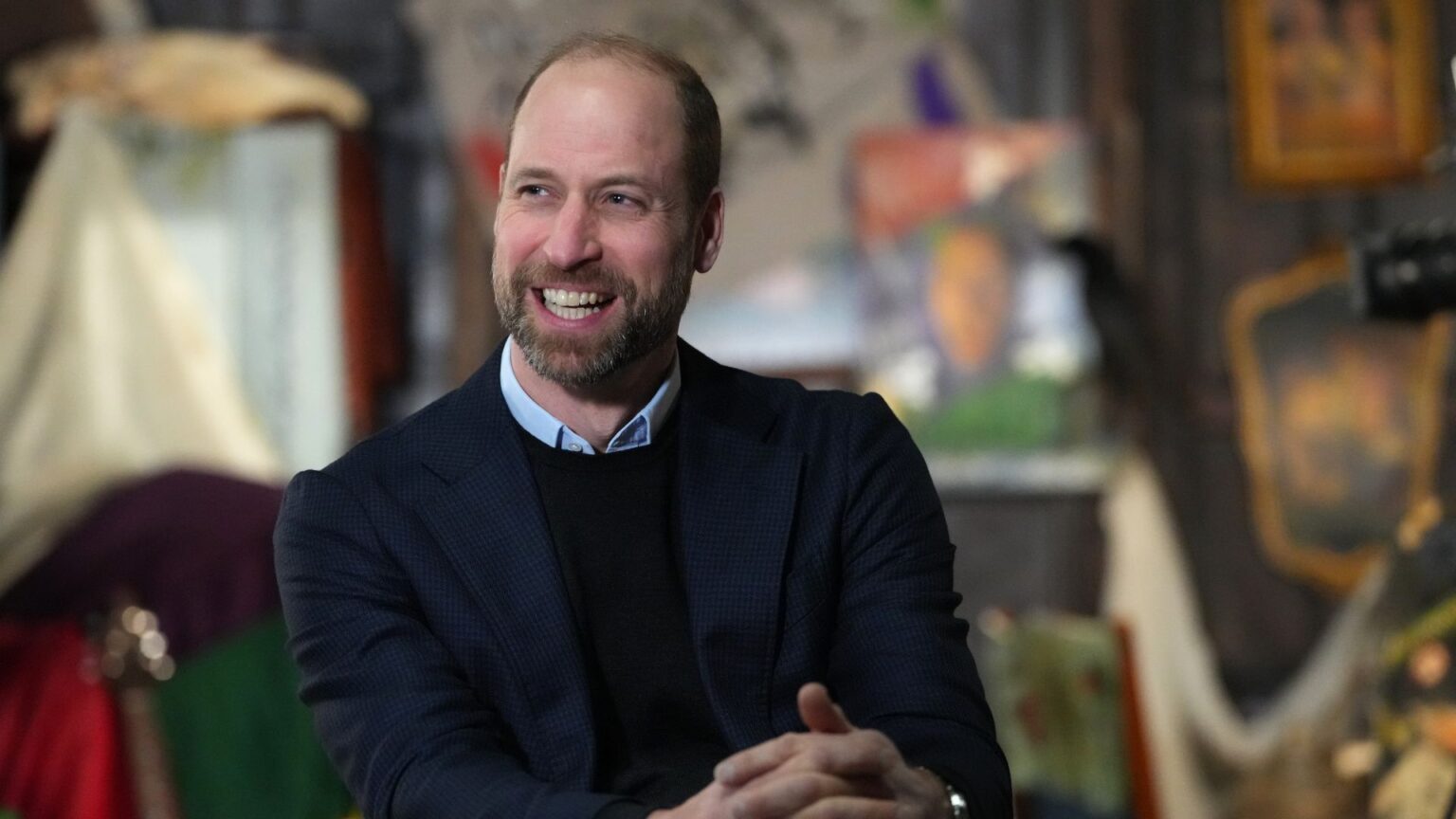 Prince William smiling as he visits the London Screen Academy