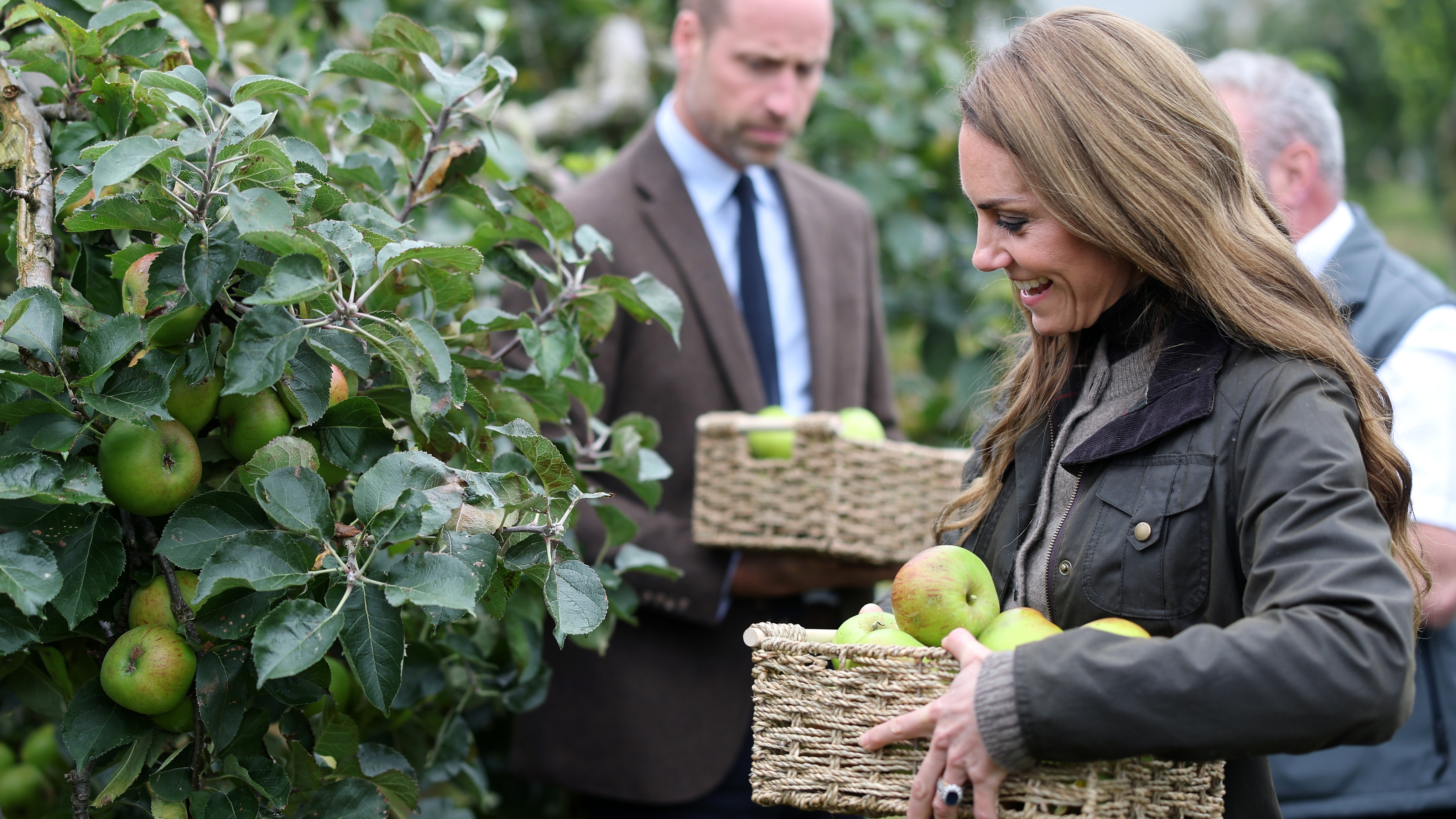 Prince William and Catherine, Princess of Wales pick apples in Long Meadow&rsquo;s orchards during a visit to Long Meadow Cider on October 14, 2025