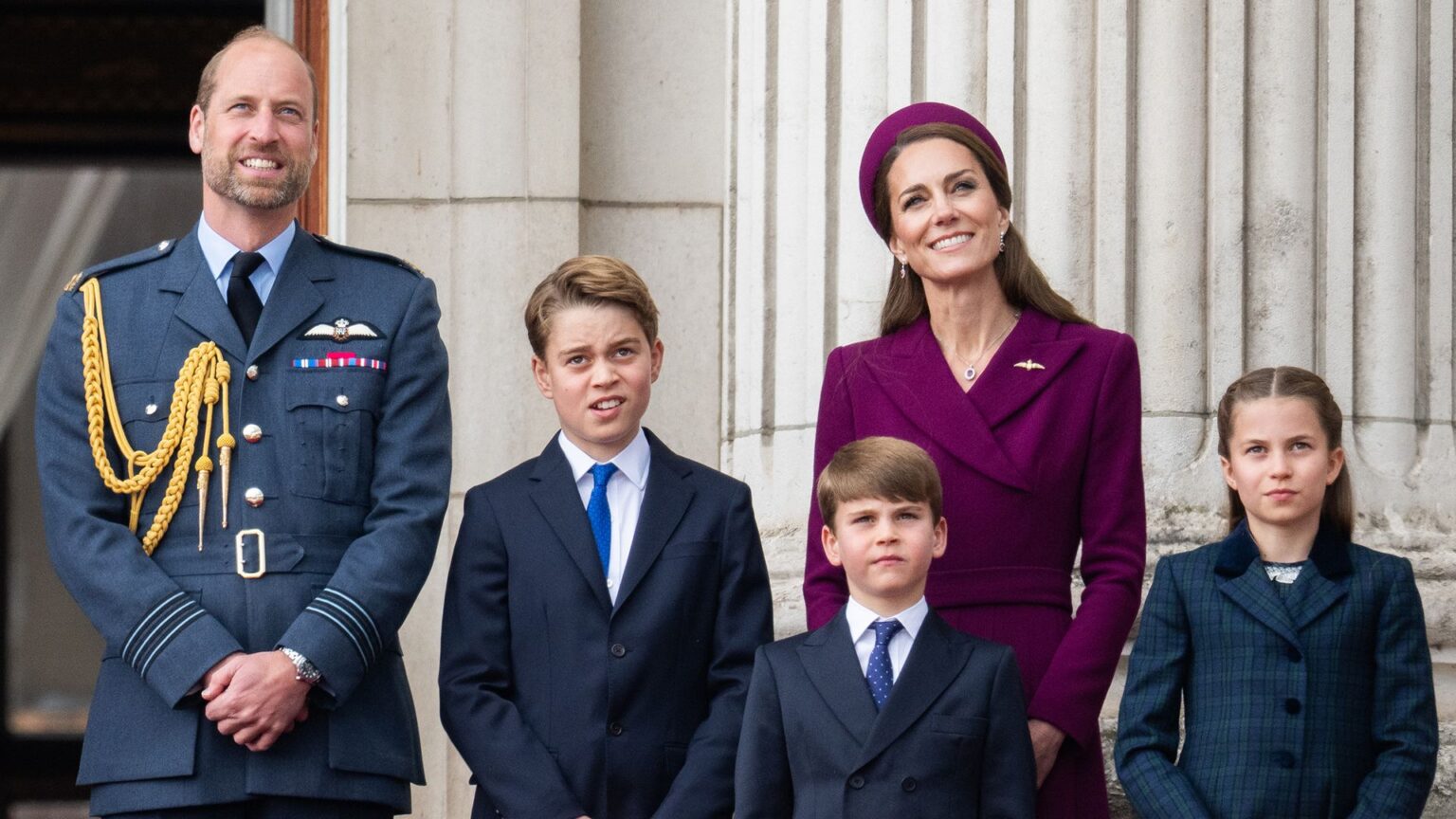 LONDON, ENGLAND - MAY 05: Prince William, Prince of Wales, Prince George, Catherine, Princess of Wales, Prince Louis and Princess Charlotte watch the flypast to mark the 80th anniversary of VE Day on May 05, 2025 in London, England. The King and Queen, joined by Members of the Royal Family, will take part in events from May 5th to May 8th to commemorate the 80th anniversary of VE Day, which signalled the end of the Second World War in Europe. (Photo by Samir Hussein/WireImage)