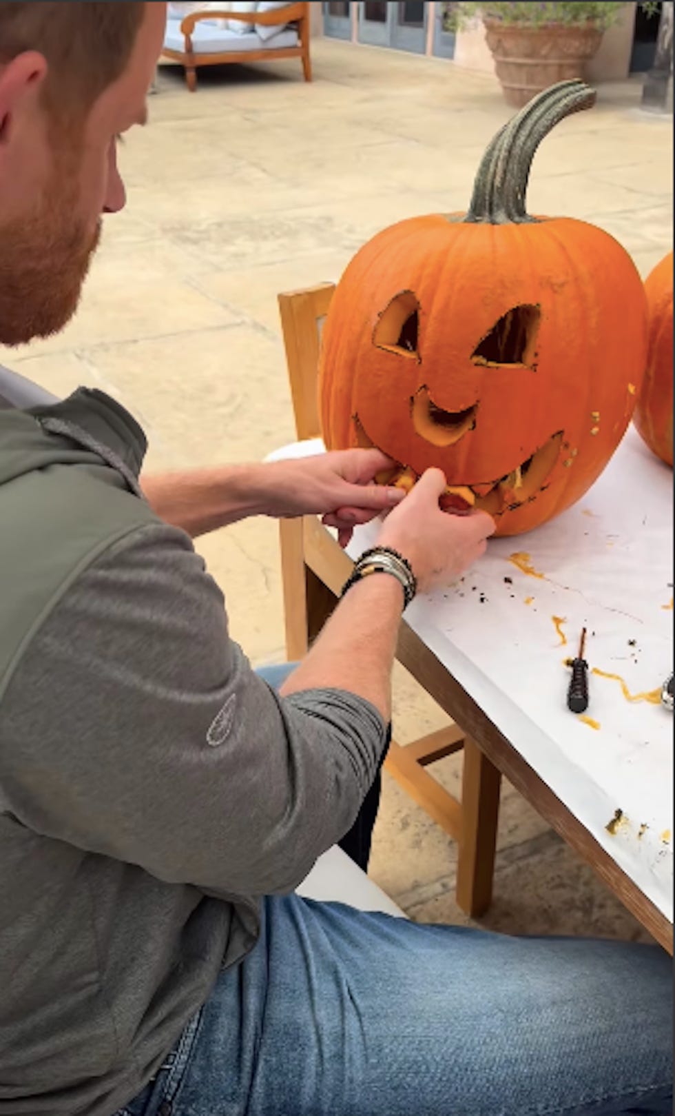 carving a pumpkin into a jackolantern carving a pumpkin into a jackolantern