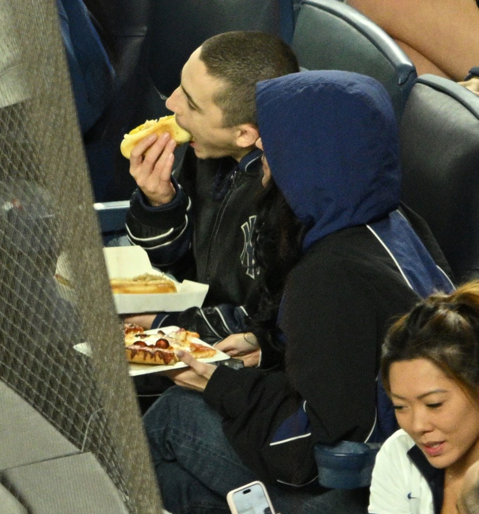 Kylie Jenner and Timothée Chalamet at the New York Yankees vs Toronto Blue Jays game.