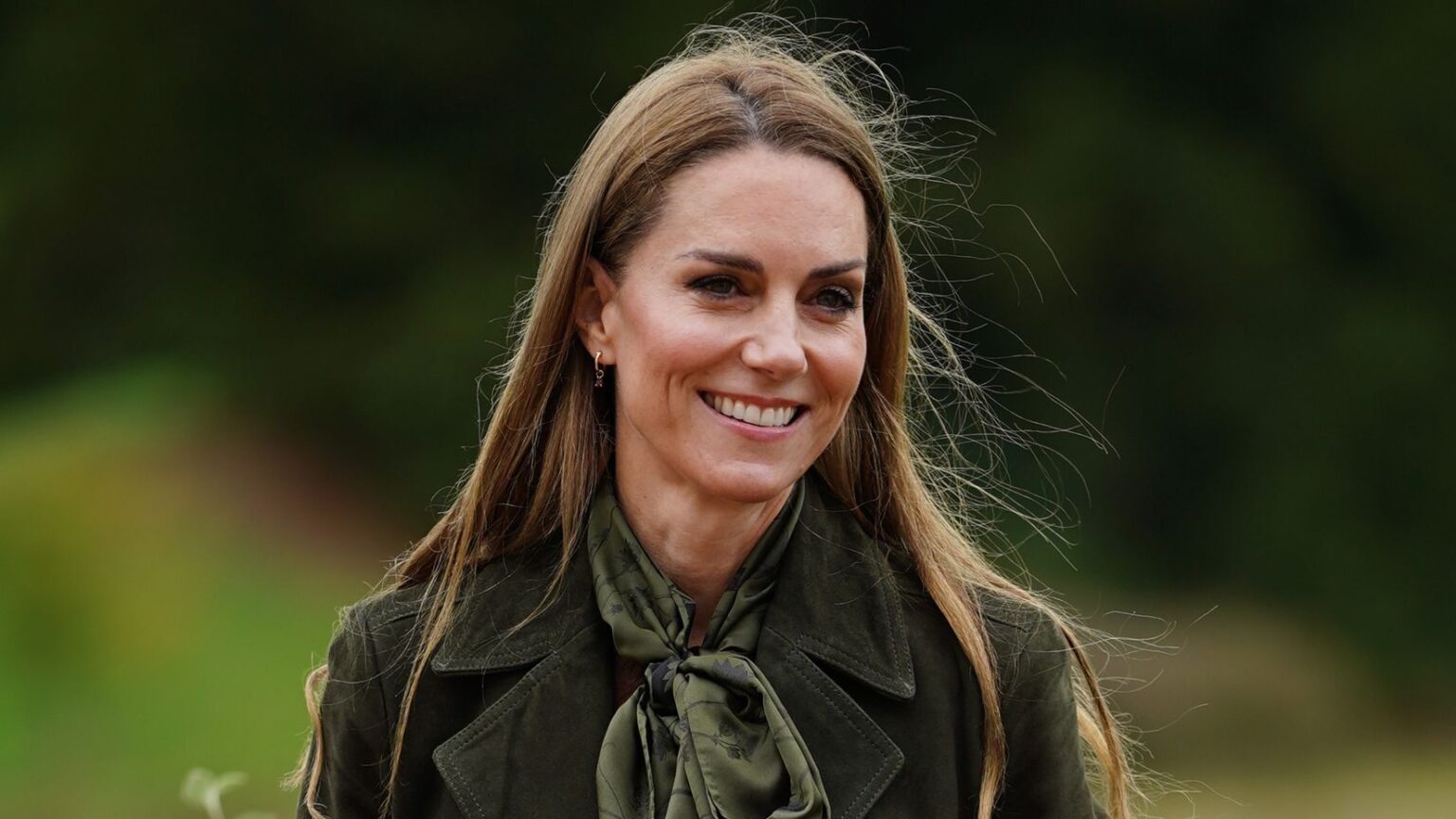 Catherine, Princess of Wales presents "Go Wild" badges as she meets members of the Scouts' Squirrels programme