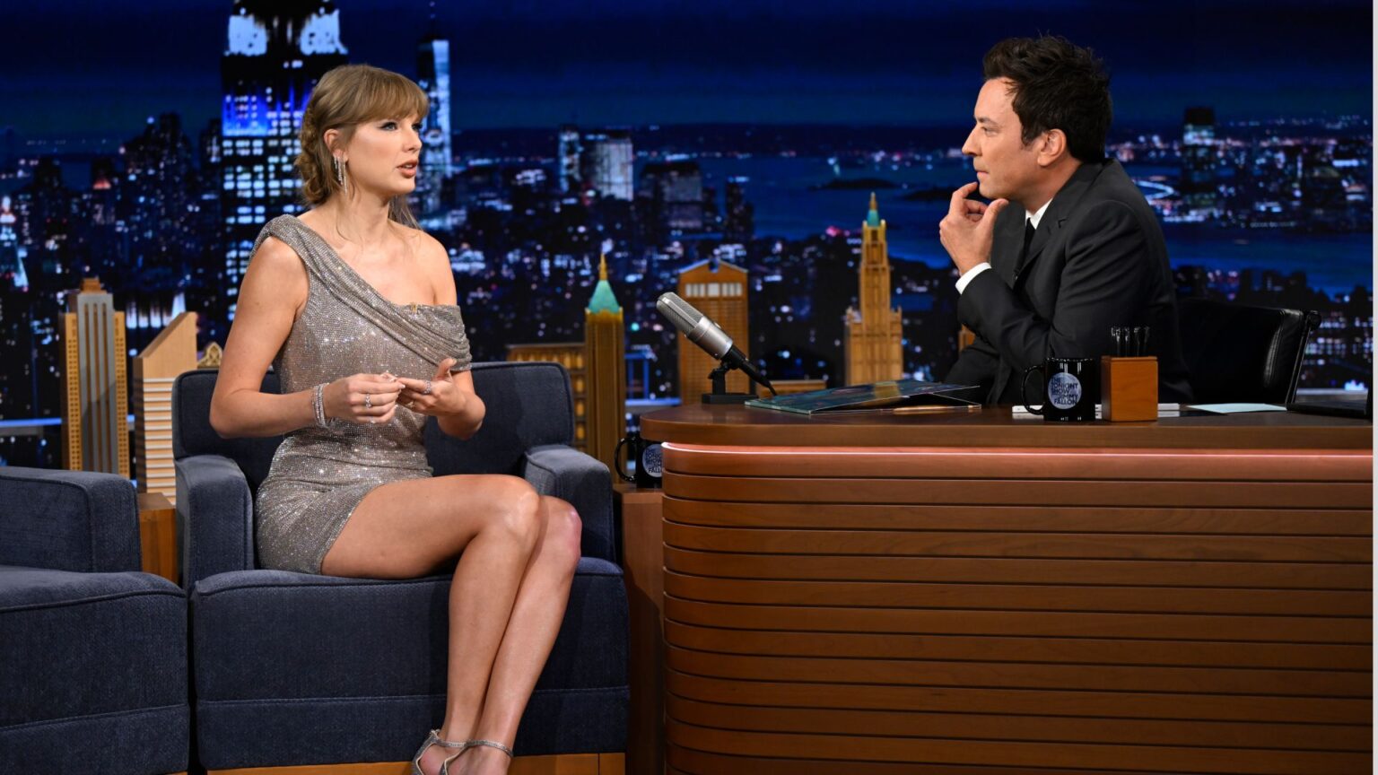 See Taylor Swift’s ‘Tonight Show’ Jimmy Fallon Interview Dress Taylor Swift on The Tonight Show With Jimmy Fallon wearing a silver dress