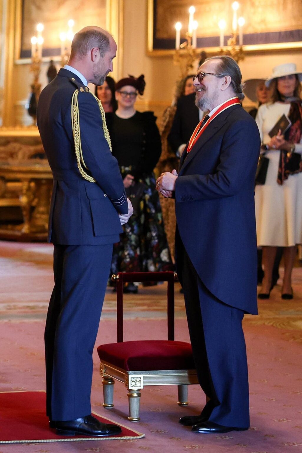 Prince William Knights Gary Oldman at Windsor Castle