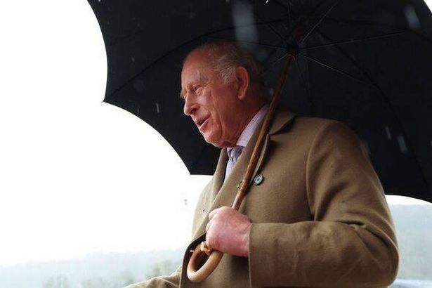 King Charles in the rain 