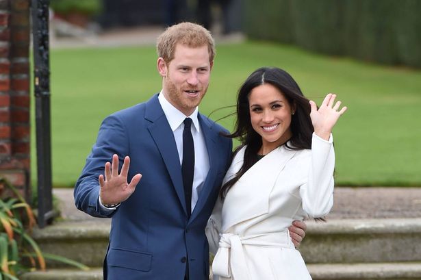 Prince Harry and Meghan Markle in the Sunken Garden at Kensington Palace