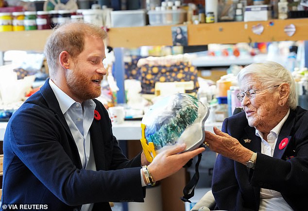 Harry speaking to veteran Brenda Reid. The Duke asked what the veteran's most memorable war story was, Ms Reid cautioned that, when it comes to her fellow residents, 'you can't always believe the boys'.