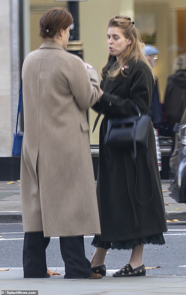 The siblings stood and chatted intensely for a long period in central London on Thursday
