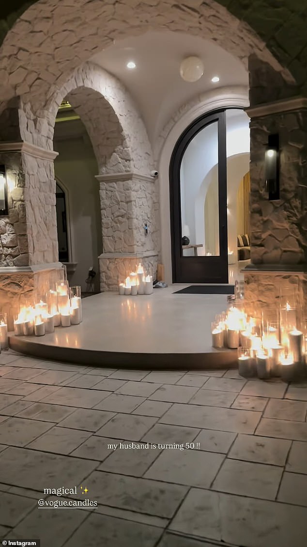 She had candles put throughout the property from the entrance stairs to the long dining table which was in the backyard