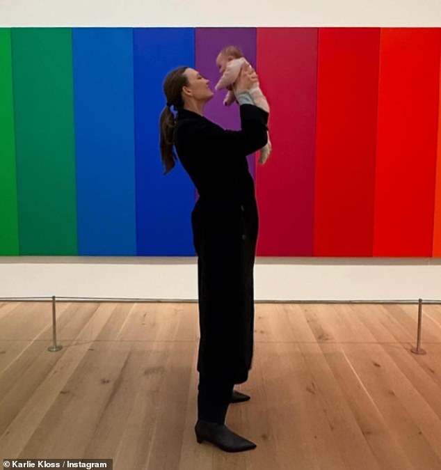 Karlie Kloss marked Thanksgiving week by visiting her native St. Louis - her first trip there with her two-month-old daughter Rae