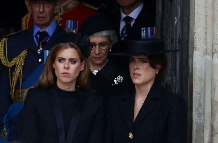 LONDON, ENGLAND – SEPTEMBER 19: Princess Beatrice (L), Princess Eugenie after the State Funeral of Queen Elizabeth II at Westminster Abbey on September 19, 2022 in London, England. Elizabeth Alexandra Mary Windsor was born in Bruton Street, Mayfair, London on 21 April 1926. She married Prince Philip in 1947 and ascended the throne of the United Kingdom and Commonwealth on 6 February 1952 after the death of her Father, King George VI. Queen Elizabeth II died at Balmoral Castle in Scotland on September 8, 2022, and is succeeded by her eldest son, King Charles III. (Photo by Hannah McKay – WPA Pool/Getty Images)