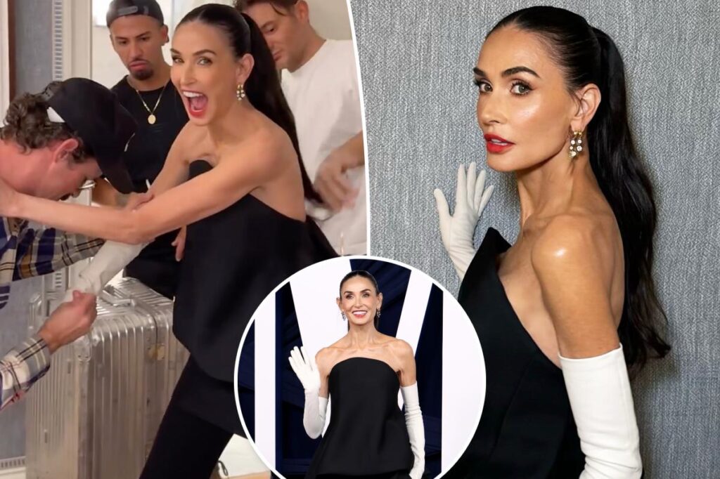 Demi Moore's gloves get stuck in Glamour Women of the Year Awards video