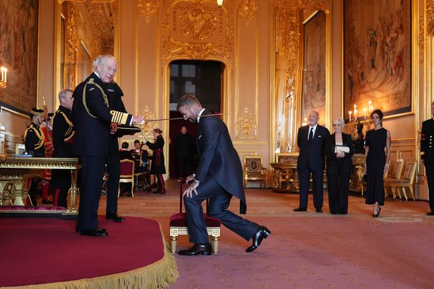 Sir David Beckham is made a Knight Bachelor by King Charles III during an Investiture ceremony at Windsor Castle, Berkshire. The honour recognises services to sport and to charity. 