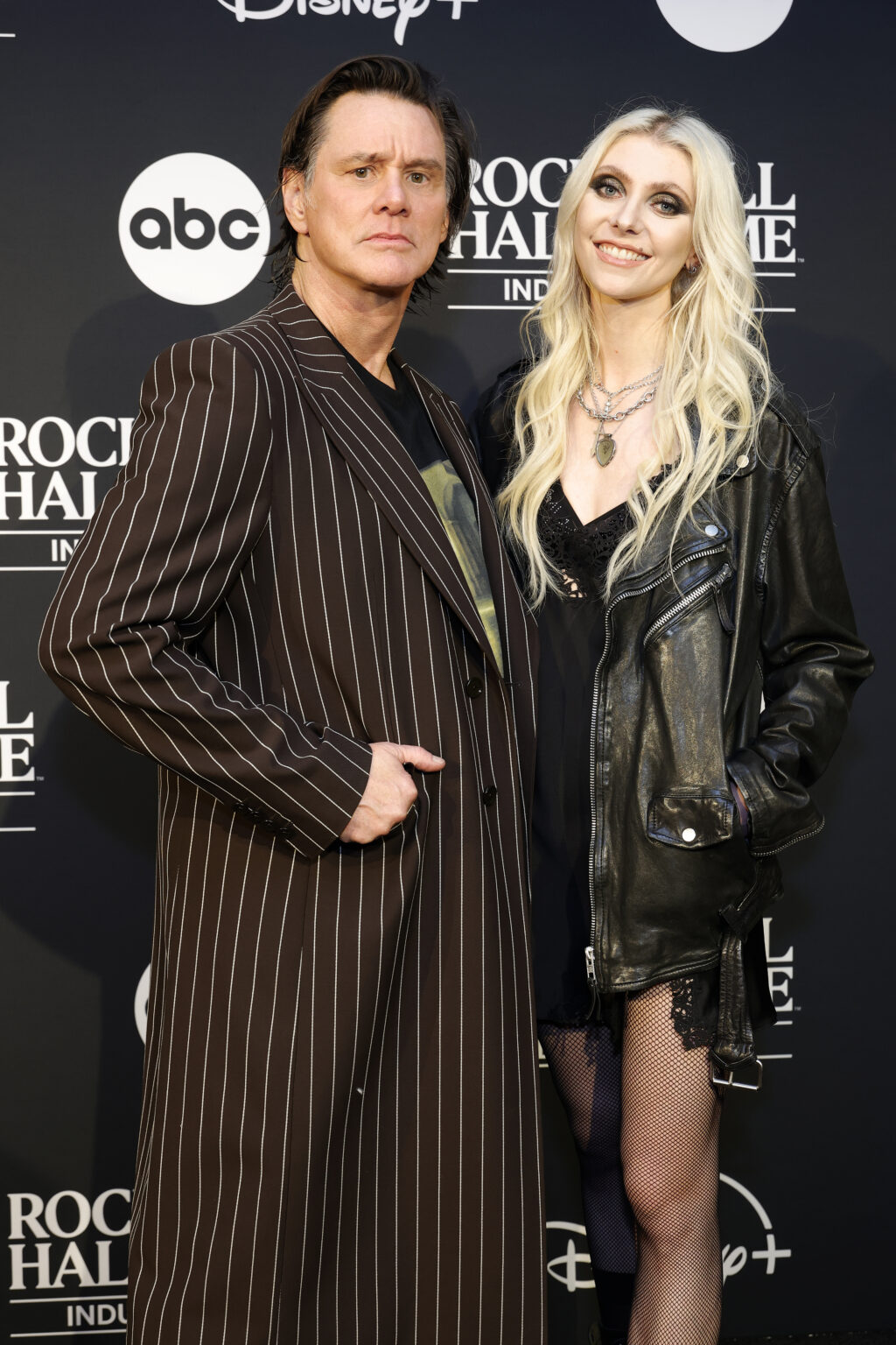 Jim Carrey and Taylor Momsen have a ‘Grinch’ reunion at the Rock & Roll Hall of Fame KOMO