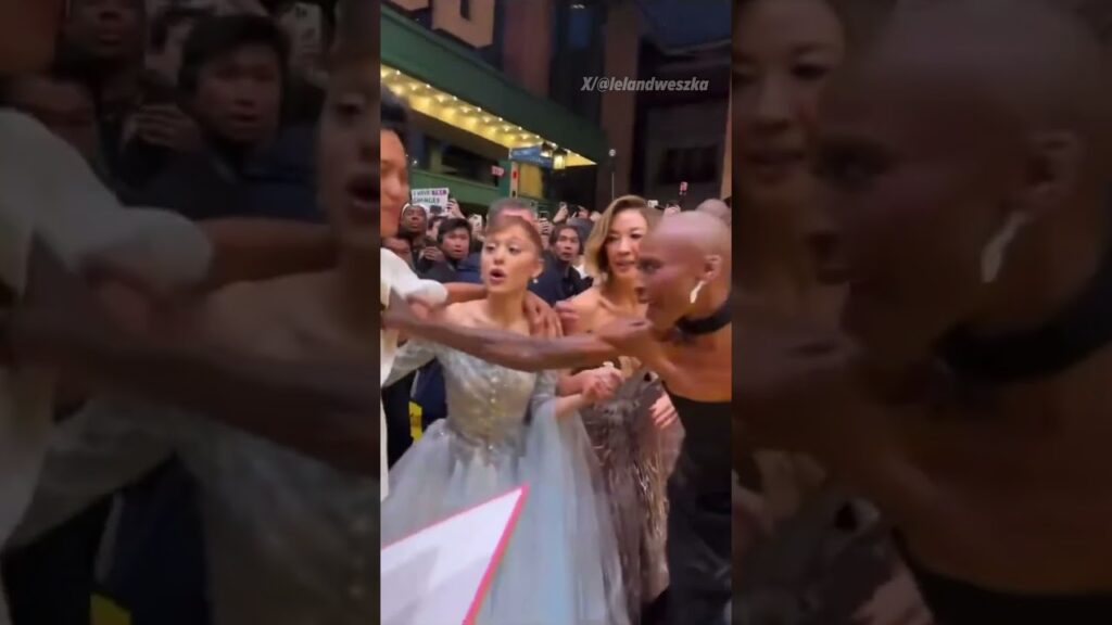 Ariana Grande was grabbed by a fan at the "Wicked: For Good" premiere and  Cynthia Erivo jumped in